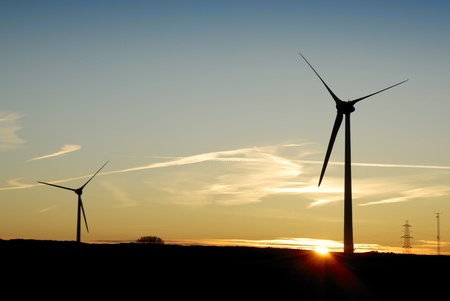 Sunrise behind a windfarm in Cornwall, UK.