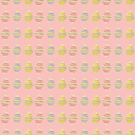 Colorful marshmallow pattern in the form of a shell on a pink background.の写真素材
