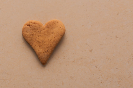 Fresh homemade gingerbread cookies lie on the table.の写真素材