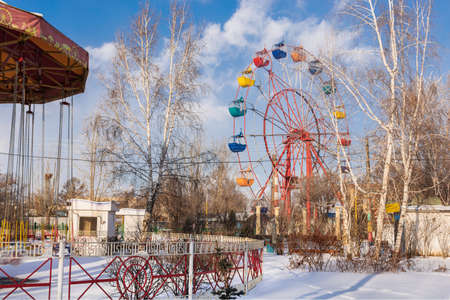Krasnoyarsk, Russia - January 20, 2021: Closed to visitors amusement park in winter.のeditorial素材