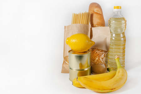 A set of products for donation in yellow tones on a white background. Delivery and donation of food...