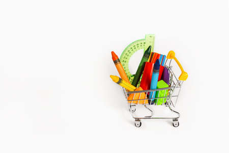 School supplies and office supplies in a trolley on a white background. Isolated.の写真素材