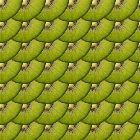Pattern from pieces of green ripe kiwi. Pieces are laid out in the form of scales. Pattern of fruit slices as a background.の写真素材