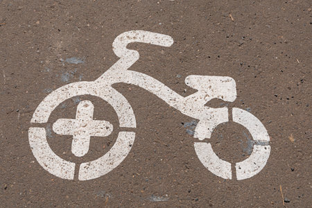 Sign for cyclists on the path in the park. Bicycle road.の写真素材