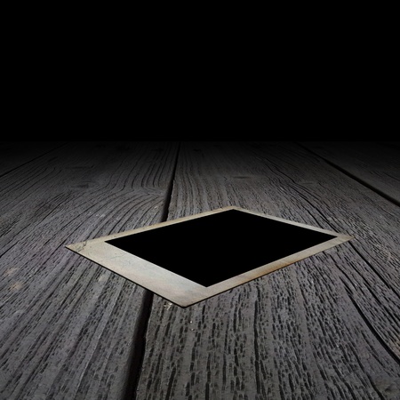 The old photo on a floorの写真素材