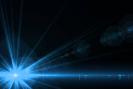 Design template - Star, sun with lens flare. Rays blue of light on a  black backgroundの写真素材