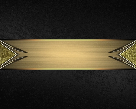 Black background with a abstract gold plate and a beautiful trimの写真素材