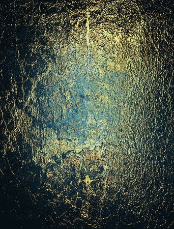 Abstract grunge dark blue textured background with spots and scratchesの写真素材