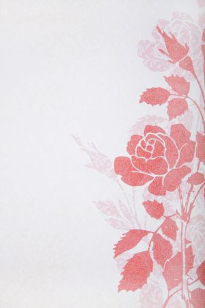 An old decorative paper background. Pink floral design on pale pink background. Floral design has gold glitter embedded.の写真素材