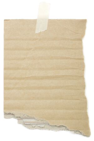 An old pice of blank cardboard, used as a note pad, isolated on white.の写真素材