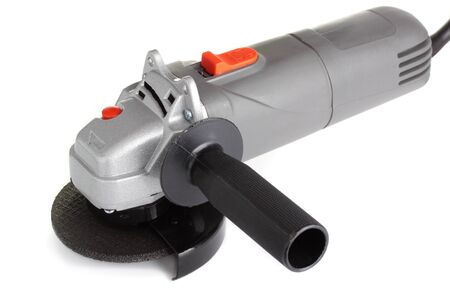 An industrial angle grinder, isolated on a white background.の写真素材