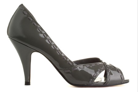 Shiny grey ladies pumps, isolated on a white background.の写真素材