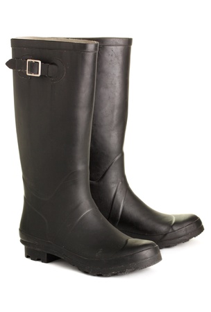 Black, rough rubber boots, isolated on a white backgroundの写真素材