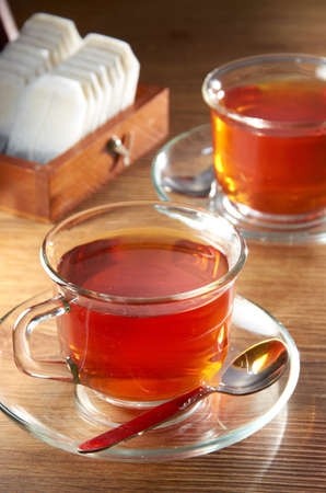 English tea with tea bag on table top settingの写真素材