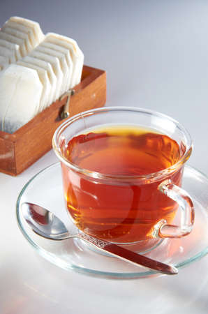 English tea with tea bag on table top settingの写真素材