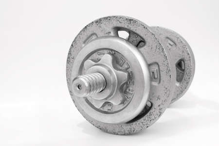 Barbell weights set against a white backgroundの写真素材