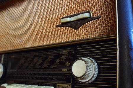 An old 1950's era Emud tube radio. Close up showing dials and buttons.のeditorial素材