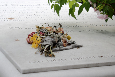 A strange bouquet is left upon a churchyard crypt that dates back to 1690 in Charleston, South Carolina, USAのeditorial素材