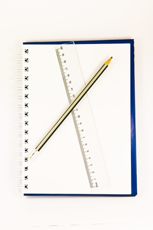Pencil and ruler on the in white backgroundの写真素材