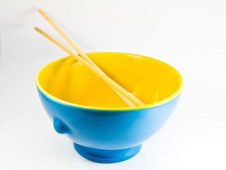 Empty bowl over white background の写真素材