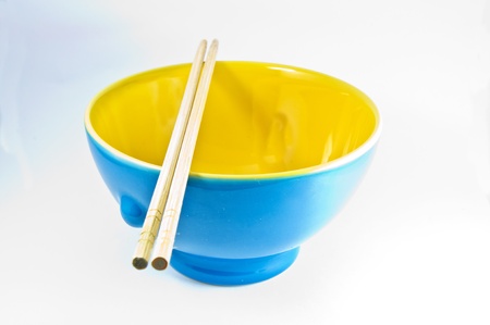 Empty bowl over white background の写真素材