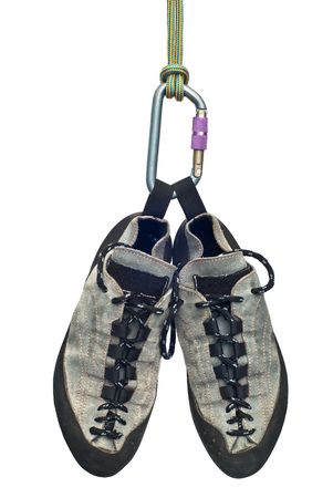 climbing shoes, carabiner and rope
