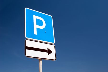 parking sign on a blue sky backgroundの写真素材