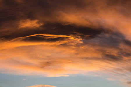 Cloud illuminated by sunriseの写真素材