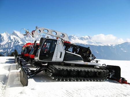 Snow machines parked in a row