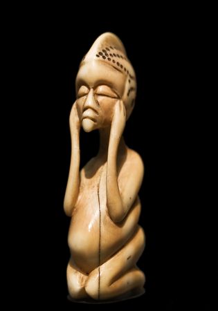 Ivory figure (african religious talisman)の写真素材