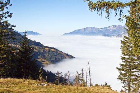 Autumn above the clouds in the alpsの写真素材