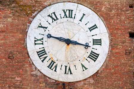 Old clock on the wallの写真素材