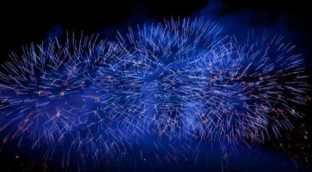 Firework streaks in the night skyの写真素材