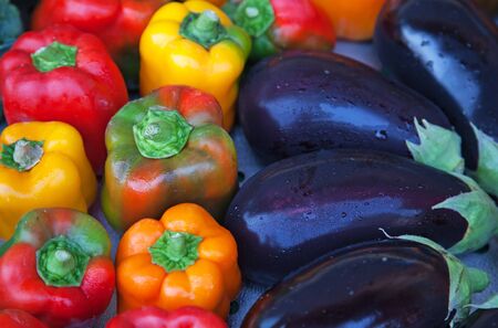 aubergines and paprika on the marketの写真素材