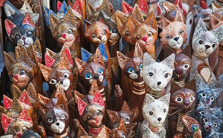 Wooden cats (souvenirs made by Balinese wood carvers)の写真素材