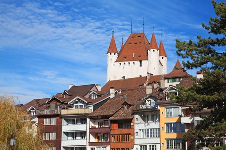 Thun castle under blue sky (Jungfrau region, cantone Bern, Switzerland)の写真素材
