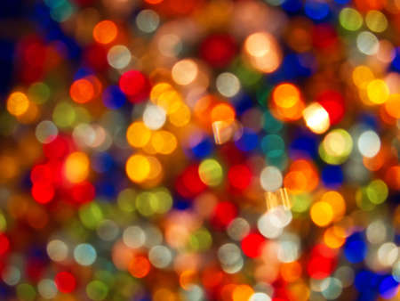 Background made of defocused ligths of the Christmas decorationsの写真素材