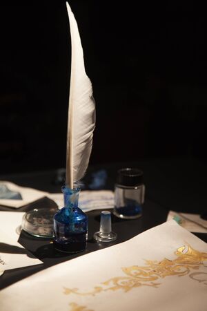 Ancient writing materials on the deskの写真素材