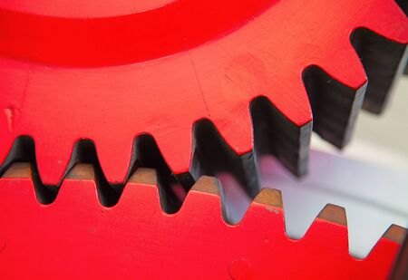 Closeup view of huge cog wheels of the train engineの写真素材