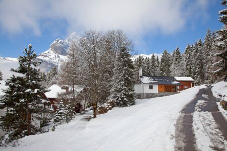 Winter holiday house in swiss alpsの写真素材