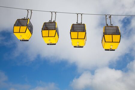 Row of cable cars in the skyの写真素材