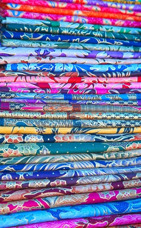 Assortment of colorful sarongs for saleのeditorial素材