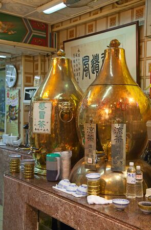 Traditional chinese kitchen with turtle soup potsのeditorial素材