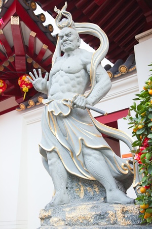 Chinese warrior sculpture on the entrance to the templeの写真素材