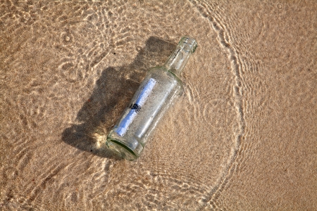 Message in a bottle on the beachの写真素材