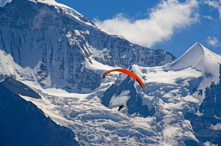 Paragliding in swiss alps Jungfrau region, Switzerlandの写真素材