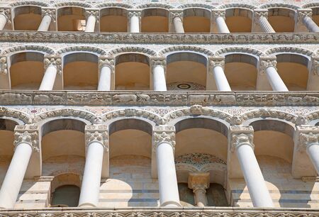 Details of facade of Grand Cathedral of Pisa, Italyの写真素材