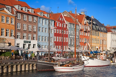 COPENHAGEN, DENMARK - AUGUST 25: unidentified people enjoying sunny weather in open cafees of the...
