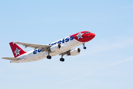 ZURICH - MAY 24:Airbus A320 "Edelweiss air" taking off in Zurich, Switzerland. Zurich International Airport is one of the major Europian Hub and home port of Swiss airline.のeditorial素材