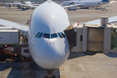 JOHANNESBURG - APRIL 18:Airbus A380 disembarking passengers after intercontinental flights on April 18, 2012 in Johannesburg, South Africa. Johannesburg Tambo airport is the busiest airport in Africaのeditorial素材